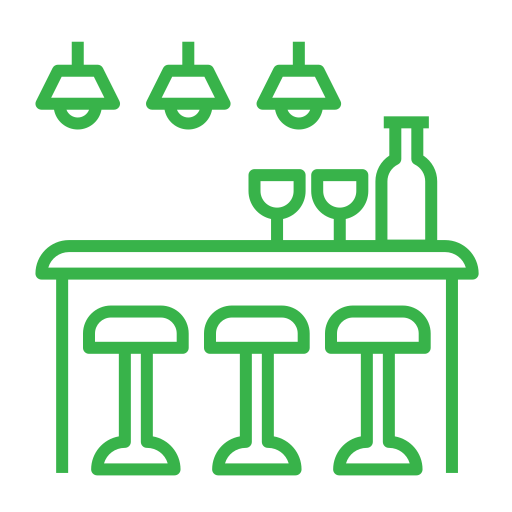 A Bar Counter Icon in Green Colour to describe our Social Lounges.